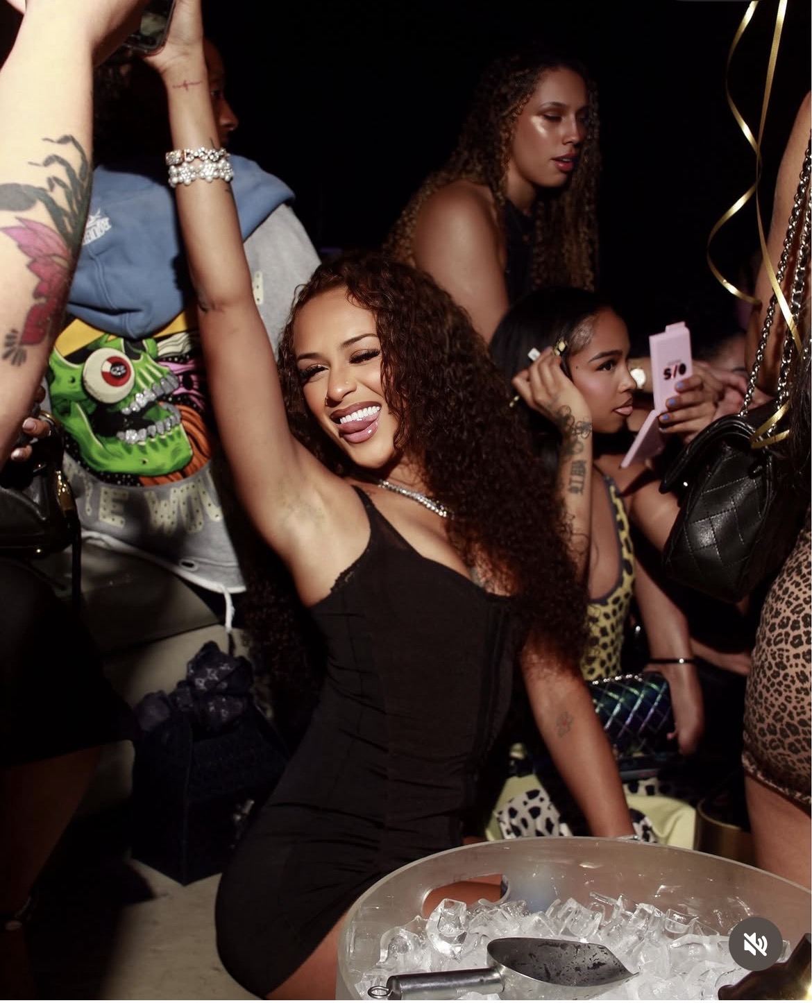 Celebration around bottle service at a night function