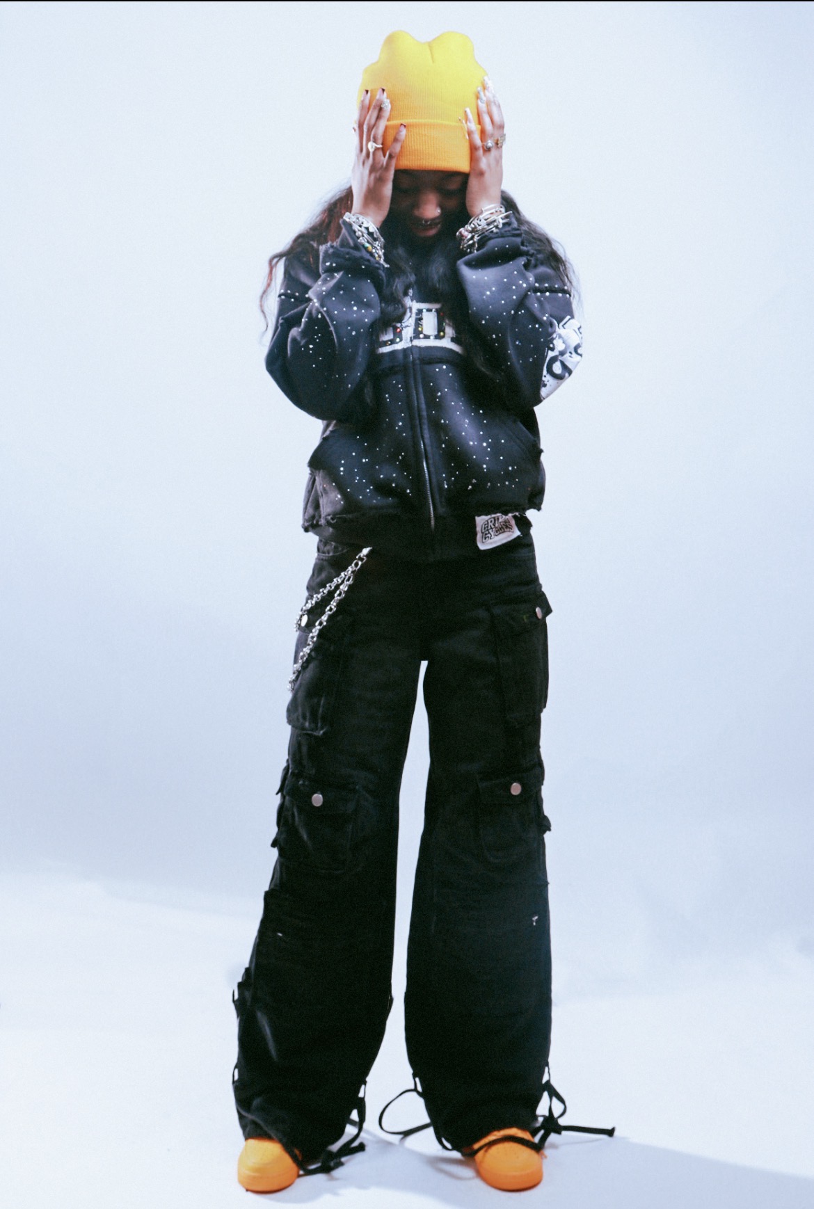 Full-length studio portrait in a leather jacket