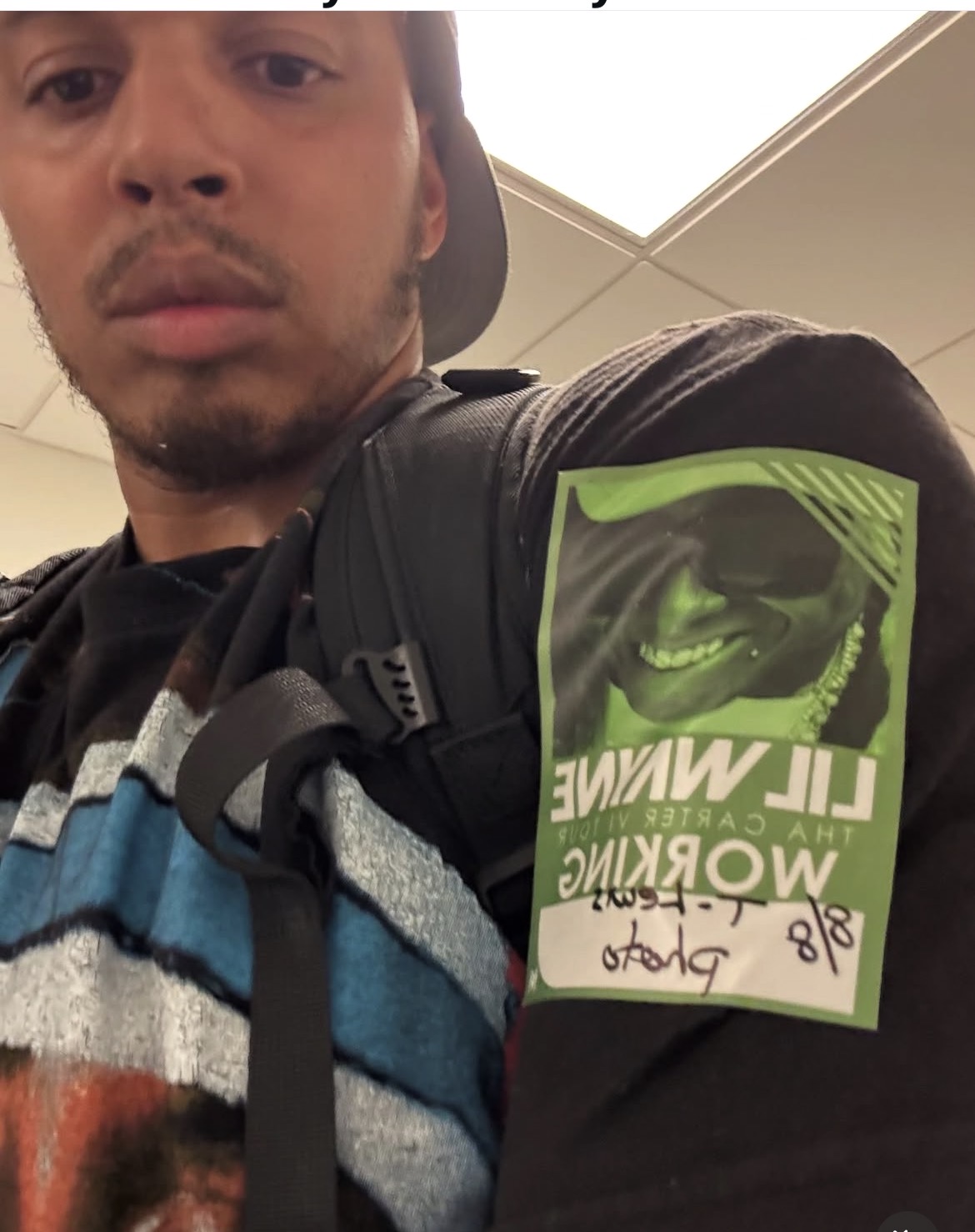Vante on location with his working credential